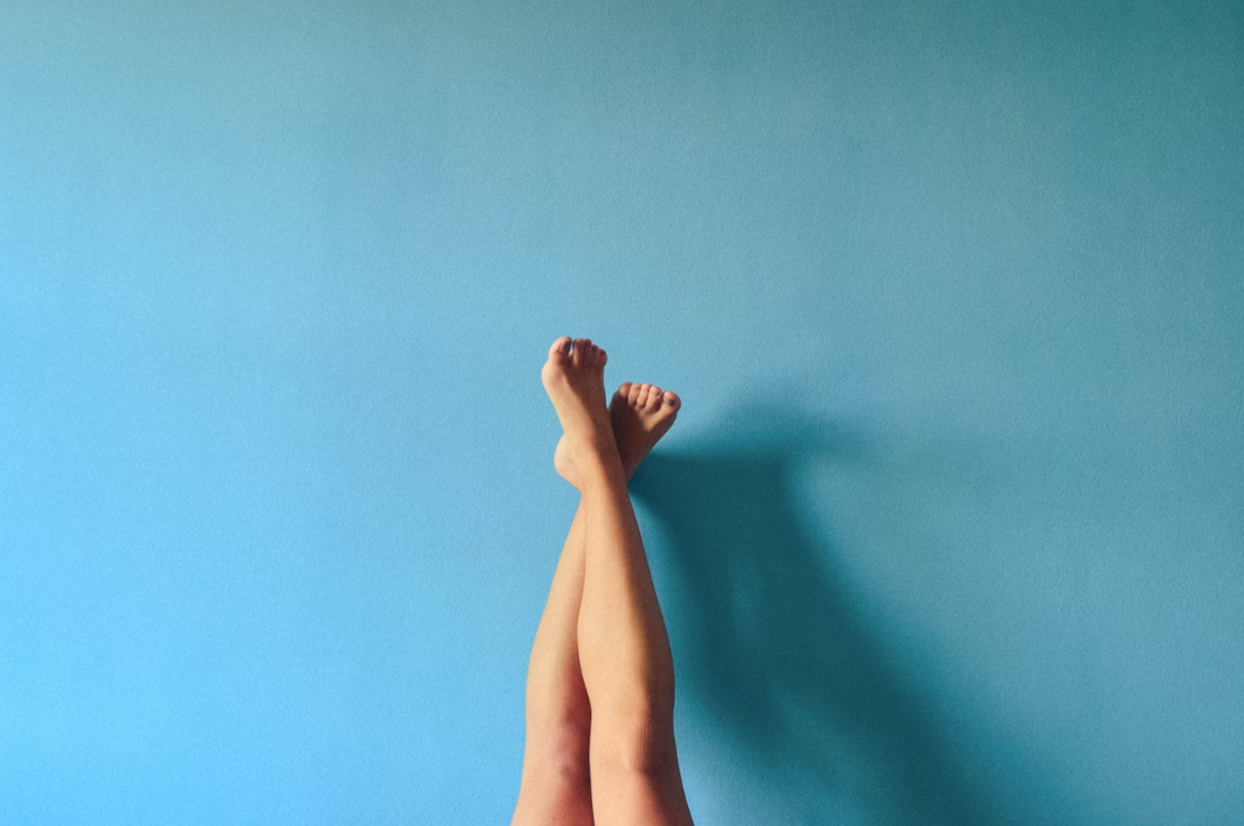legs against blue background