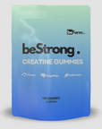 beStrong Creatine Gummies packaging with a gradient blue and green design on a light gray background.