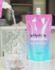 video showing behydrate performance drink being poured into a glass with ice