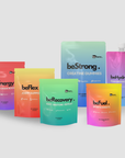 Collection of colorful supplement packages with brand names on a light gray background