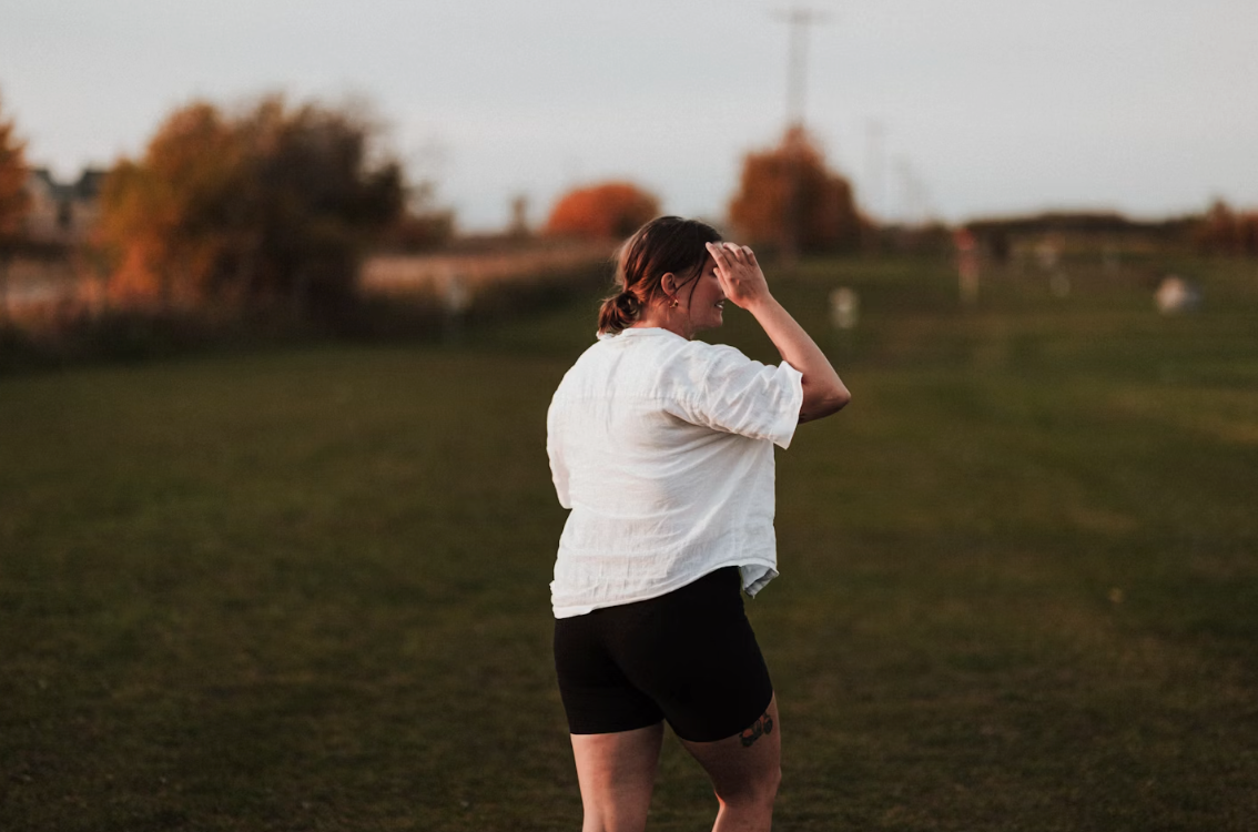 overweight female on a field