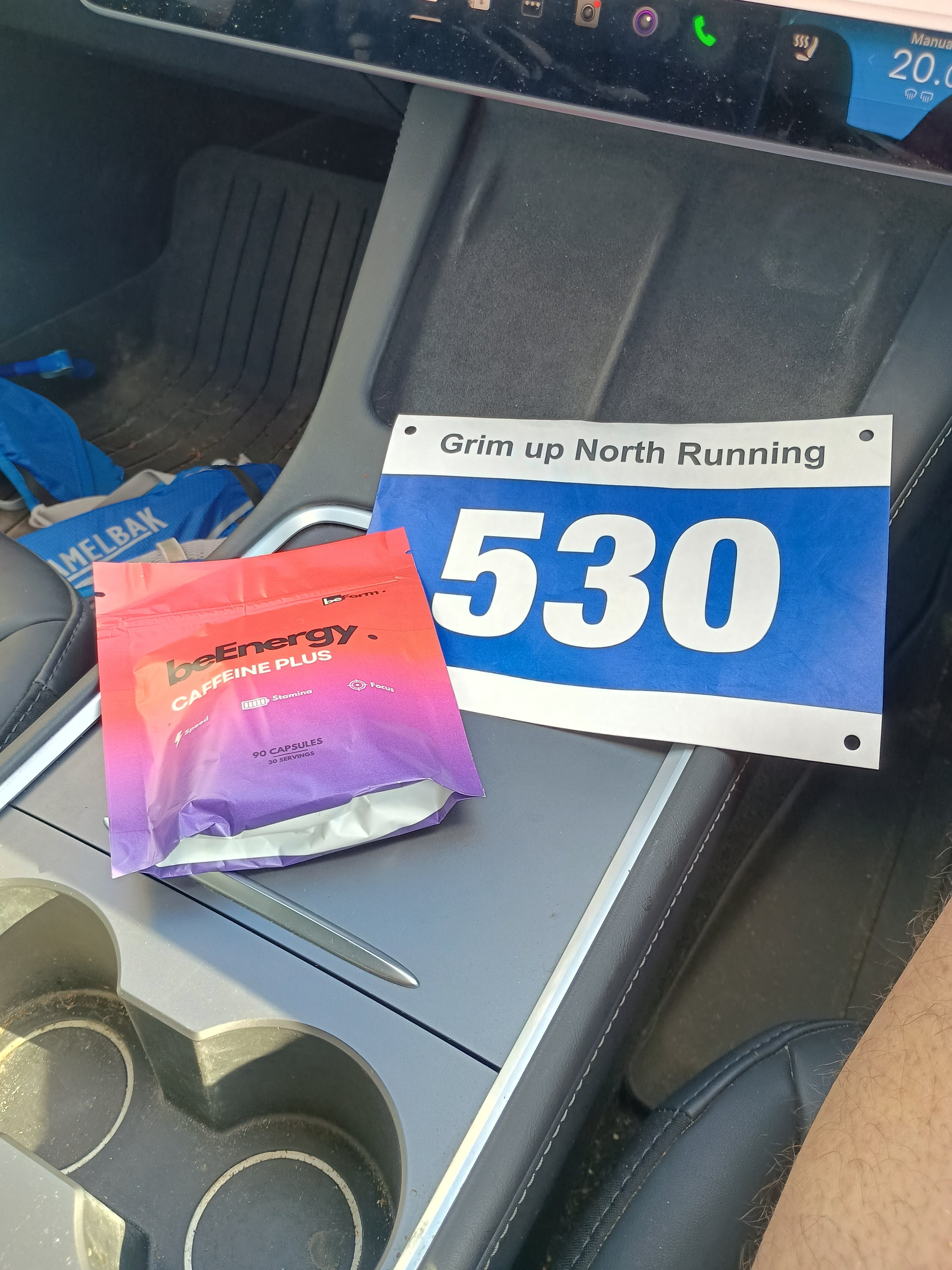 Number 530 sign inside a vehicle with beenergy supplement packet.