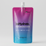 beHydrate performance drink pouch with gradient purple to blue design on a gray background