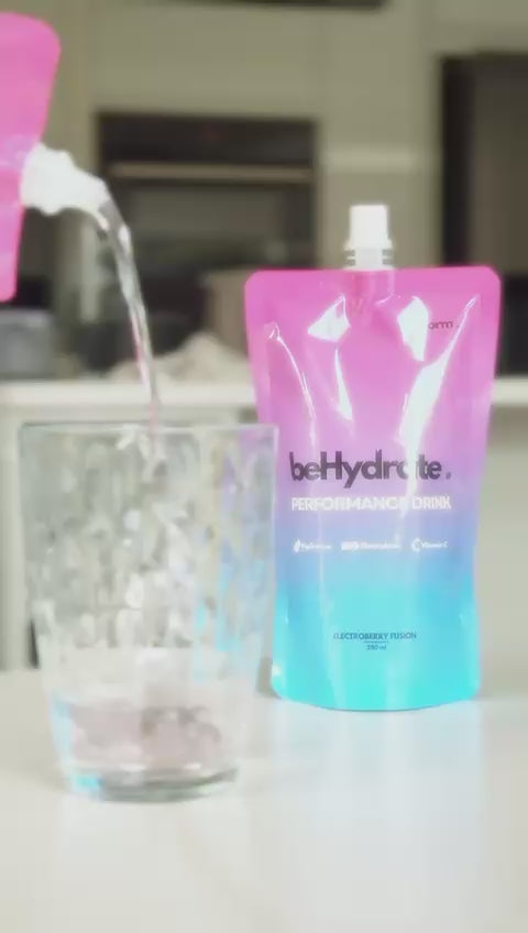 video showing behydrate performance drink being poured into a glass with ice
